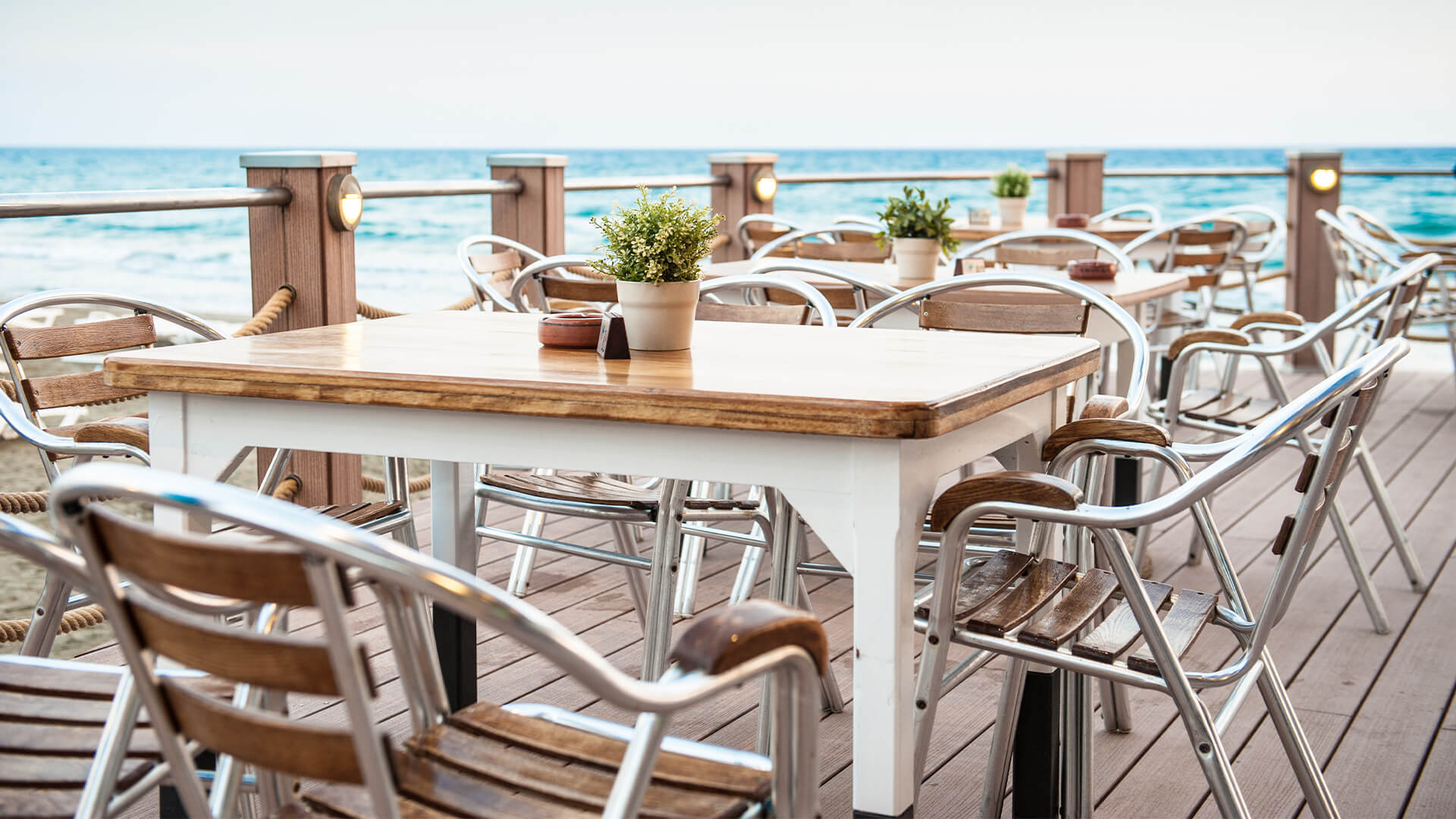 Outdoor tables and chairs near the seaside